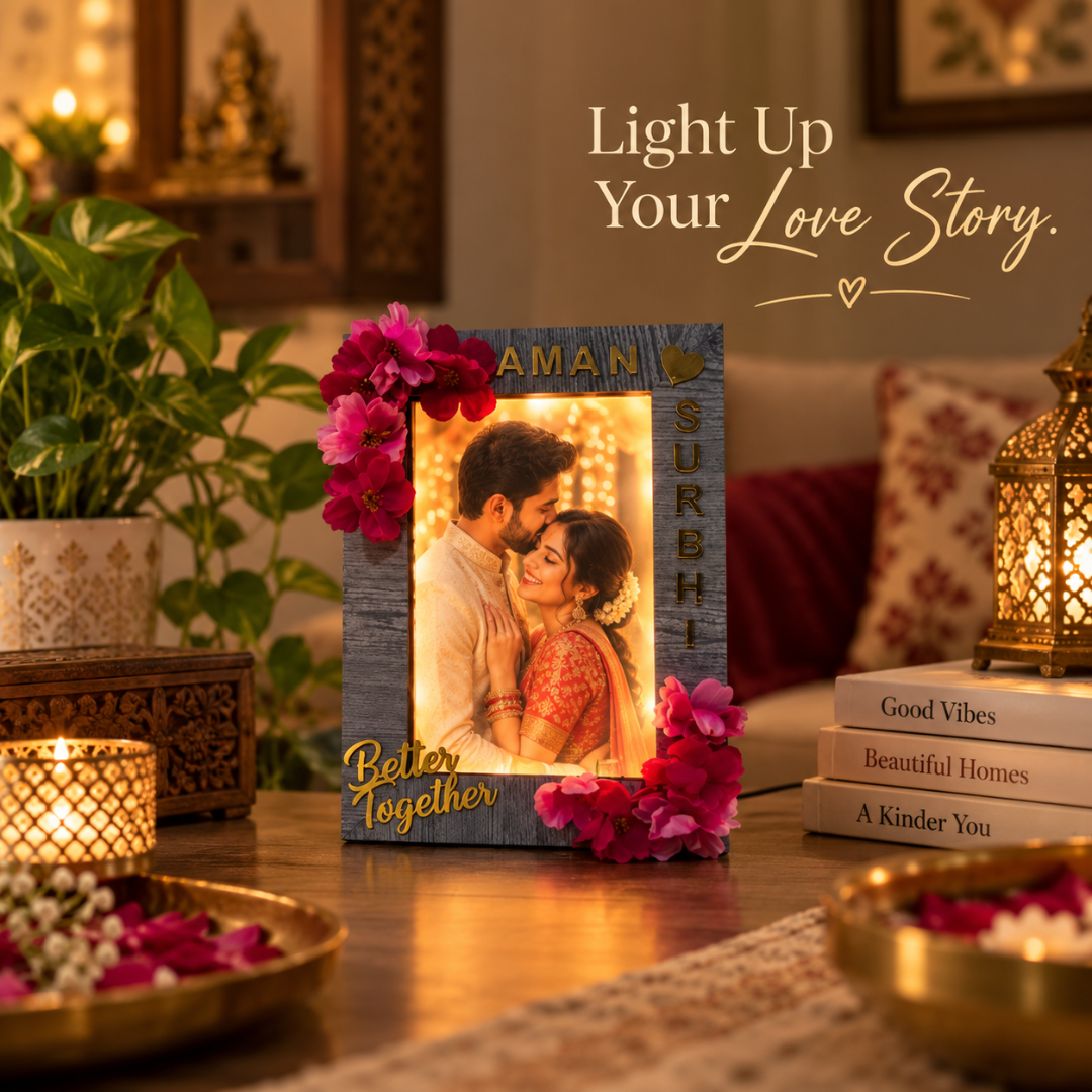 LED photo frame with floral decoration on a warmly lit table