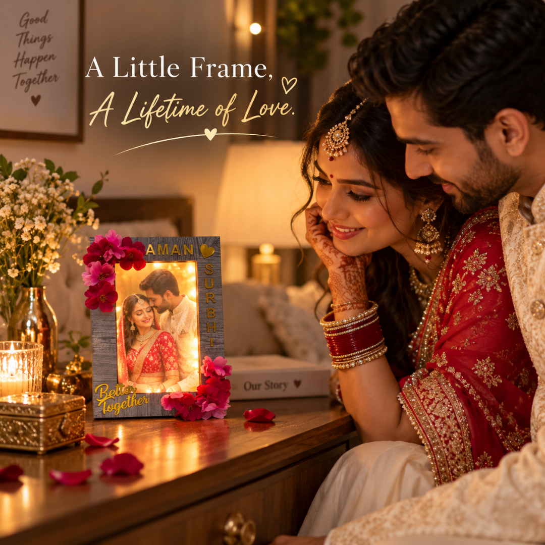 Couple admiring a floral LED photo frame