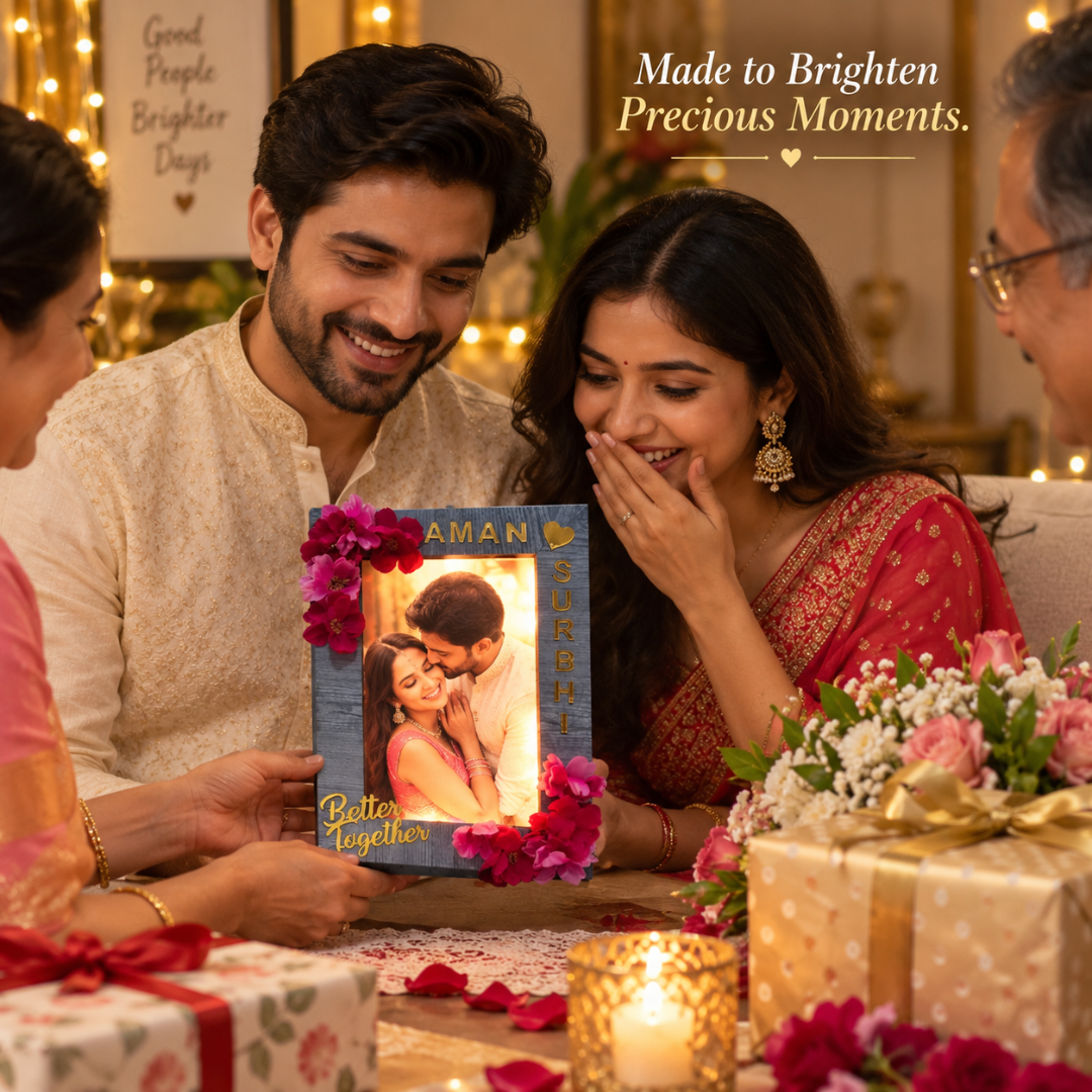 Couple opening a personalized LED frame gift