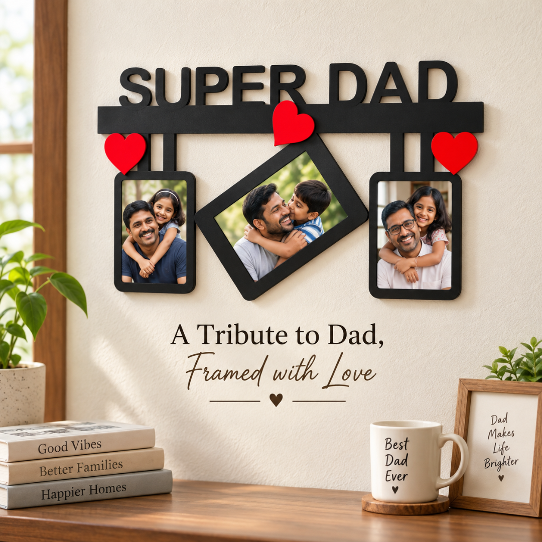Close-up of the black Super Dad three-photo wall frame with red heart accents on a cream wall.